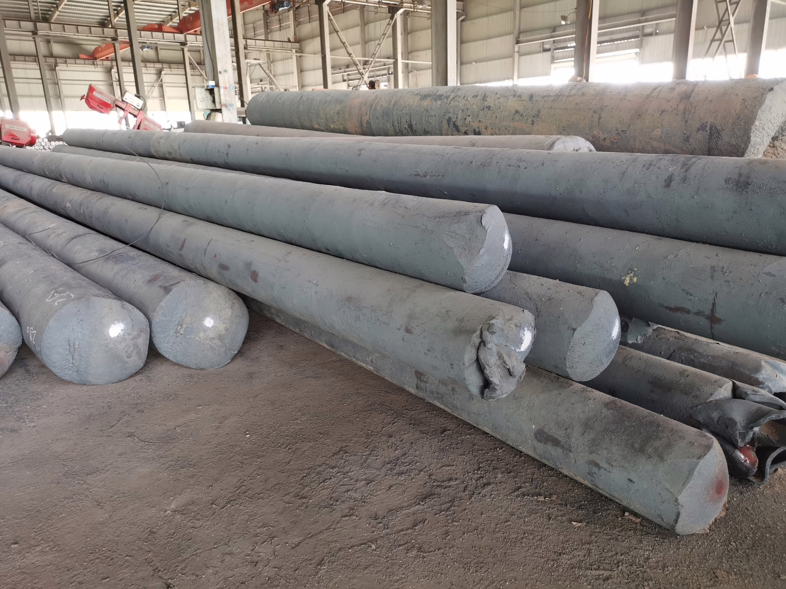 Forged tool steel bars prepared for further processing and inspection